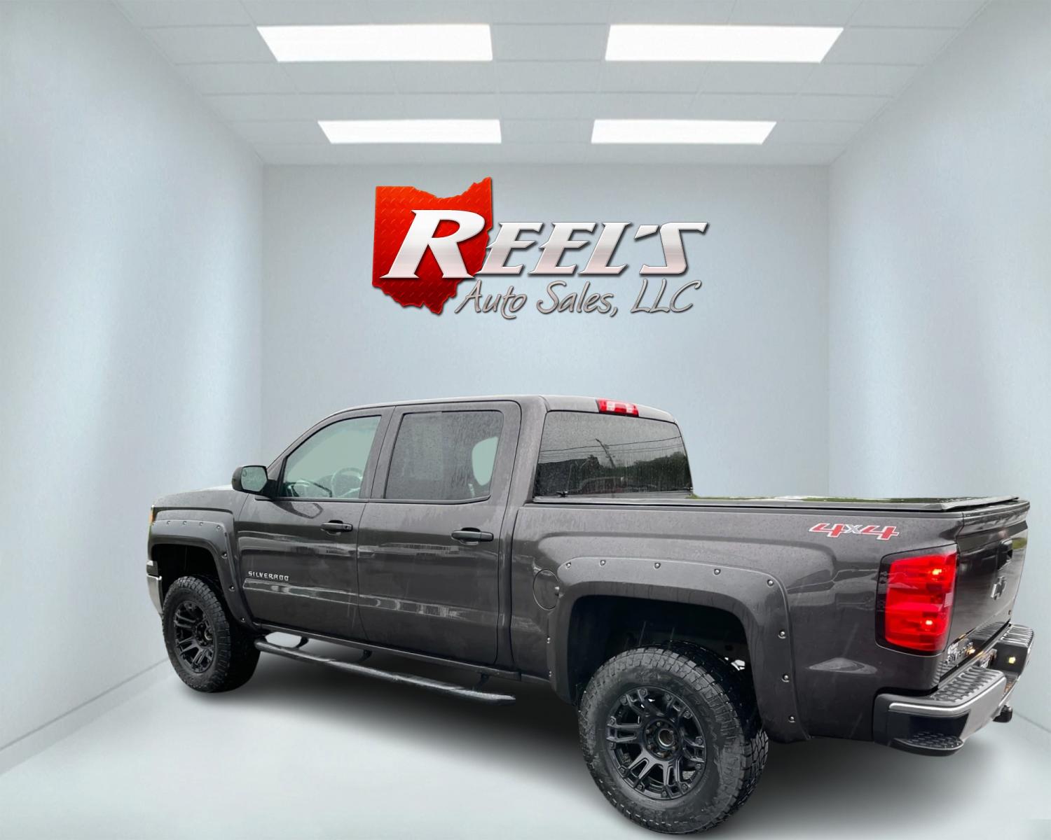 2014 Gray /Black Chevrolet Silverado 1500 LT Crew Cab 4WD (3GCUKREC7EG) with an 5.3L V8 OHV 16V engine, 6-Speed Automatic transmission, located at 11115 Chardon Rd. , Chardon, OH, 44024, (440) 214-9705, 41.580246, -81.241943 - This 2014 Chevrolet Silverado 1500 LT Crew Cab is a capable and well-equipped pickup truck. It's powered by a 5.3L Vortec V8 engine mated to a 6-speed automatic transmission with 3.42 gearing, delivering a robust 9,100-pound towing capacity. This particular model is lifted and rides on 33-inch all-t - Photo #8